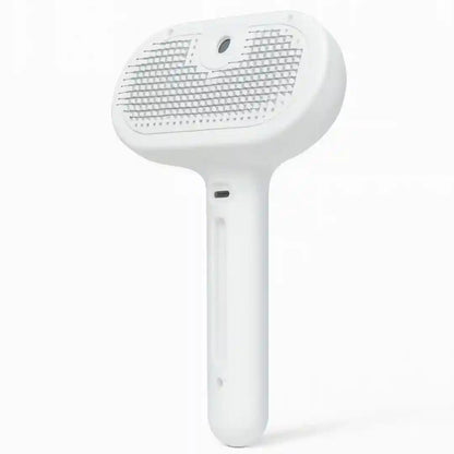 Escova spray massageadora branca para remoção de pelos de pets em fundo branco